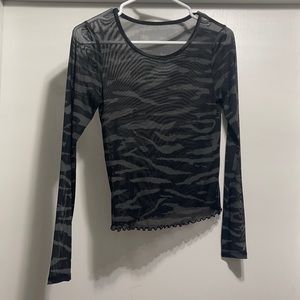 see through zebra print crop top. can’t remember the brand maybe forever 21
